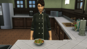 Simette avec salade dans cuisine .