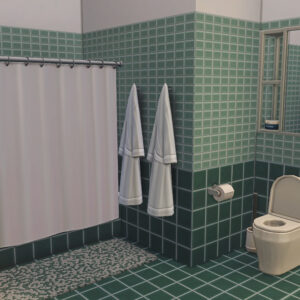 Salle de bain moderne carrelée verte.
