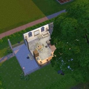 Vue aérienne d'une maison Simsdans un jeu.