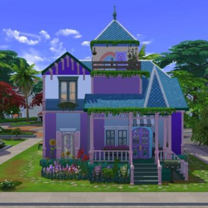 Maison colorée en environnement tropical.