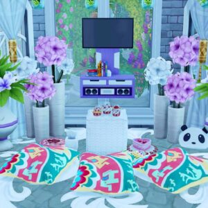 Salon coloré décoré avec des fleurs et oreillers.