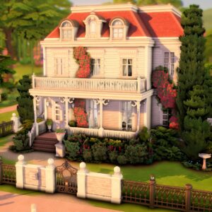 Maison blanche avec jardin verdoyant.