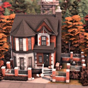 Maison à étage en briques avec jardin clôturé.
