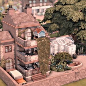 Grande maison en briques avec balcons et jardin.