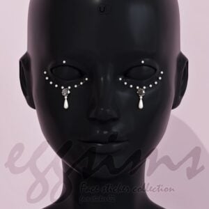 Decorative face stickers, pearls and gems.