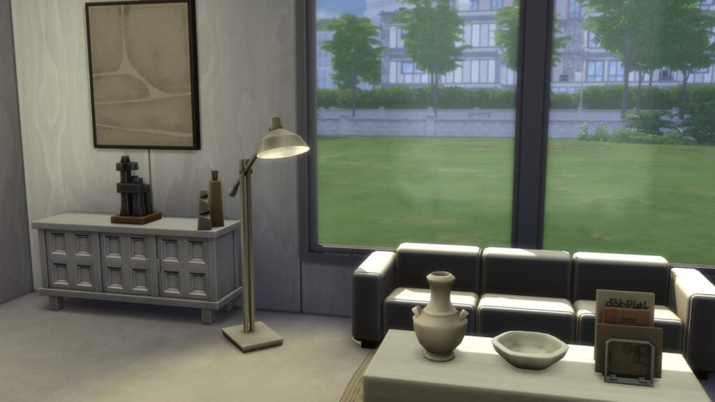 Salon moderne dans Les Sims 4 avec canapé