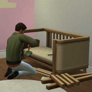 Jeu vidéo *Les Sims 4* : personnage assemblant un berceau