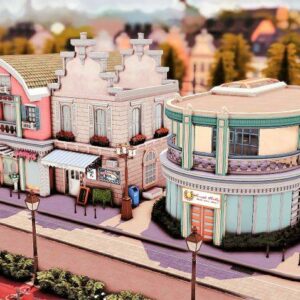 Village mignon du jeu *Les Sims 4* avec bâtiments colorés