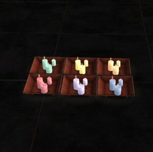 6 bougies pastel et 2 plateaux en bois par Loverat